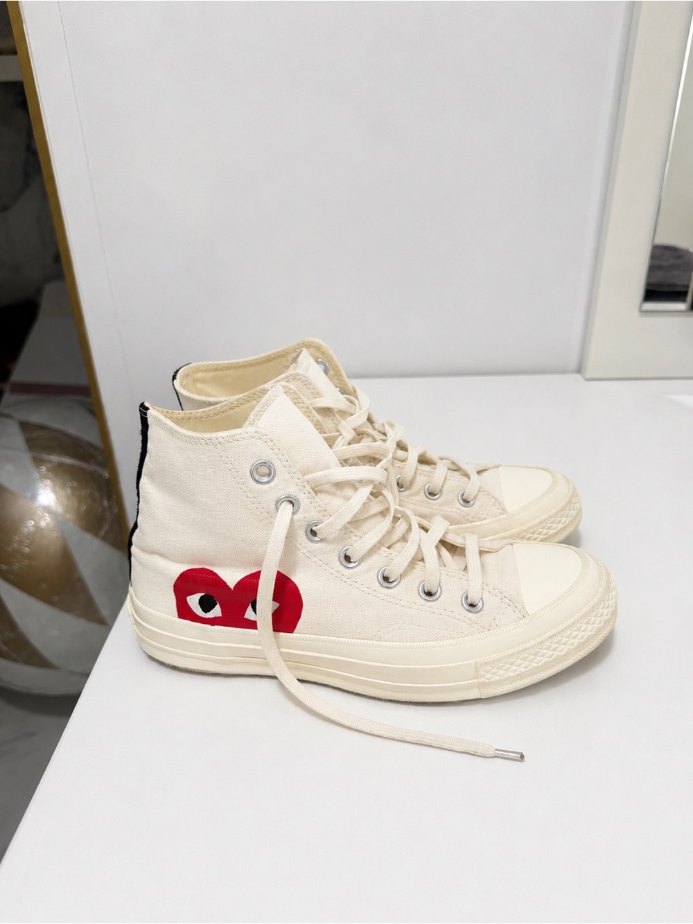 Comme Des Garçons Play x
Converse
